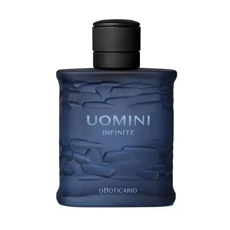 Frasco retangular azul marinho com texturas onduladas, tampa preta e letras com degradê em tons de azul, contendo 100ml de desodorante colônia da marca Uomini Infinite.