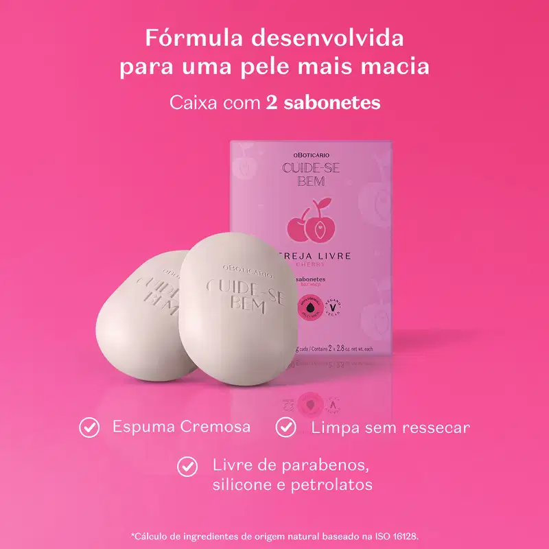 Caixa roxa com letras pretas e cerejas rosa ilustradas ao lado de dois sabonetes em barra brancos em formato ovalado da marca Cuide-se Bem Cereja Livre em fundo rosa com letras brancas informando os benefícios do produto.