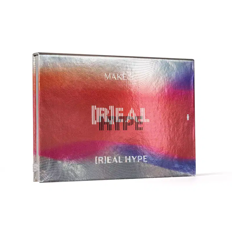 Estojo fechado da paleta de maquiagem multifuncional Real Hype da marca Make B. em tons de azul e vermelho com letras brancas.