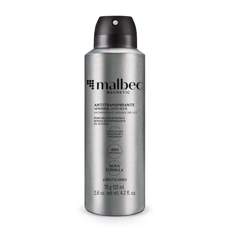 Imagem de um frasco de aerossol prateado com letras e tampa pretas da marca Malbec Magnetic, com rótulo indicando ser um desodorante antitranspirante de jato seco com perfumação intensiva e sensação refrescante, sem álcool.