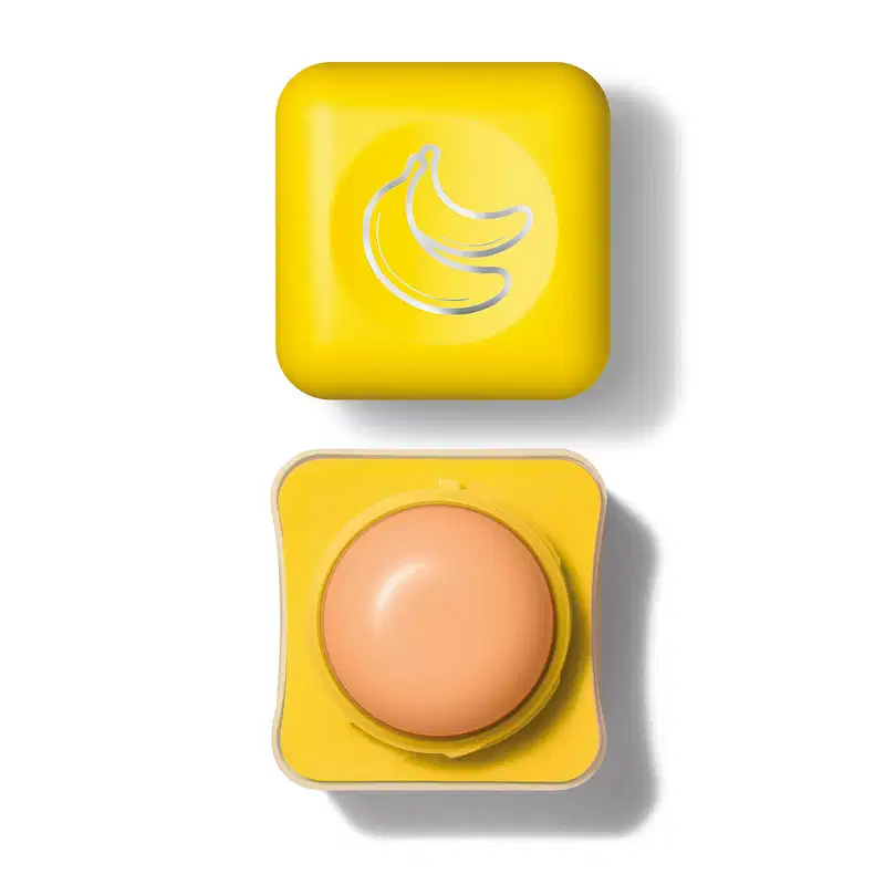 Embalagem quadrada com roll-on amarelo de balm labial da marca Intense Cuide-se Bem Banana. A tampa também é amarela com ilustração de bananas em prateado.