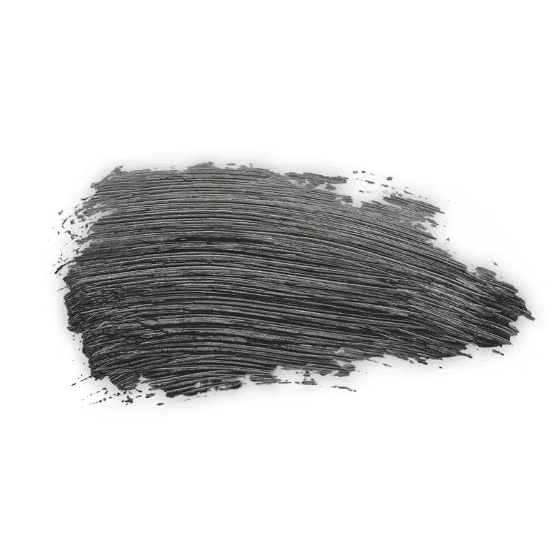 Textura escura e espessa de mascara para cílios Make B. Explosion Grow com acabamento brilhante e superfície irregular, aparentando consistência cremosa ou pastosa.
