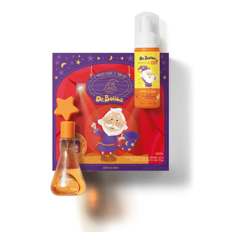 Kit  Dr. Botica contendo caixa de presente com personagem da marca, frasco com válvula spray e rótulo amarelo e laranja também com o personagem da marca e frasco com líquido laranja e estrela laranja na conta de colônia infantil Poção da Criatividade.