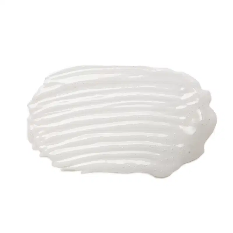 Textura cremosa e brilhante do sérum para cílios e sobrancelhas Explosion Grow da marca Make B., com listras brancas e transparentes em fundo branco.