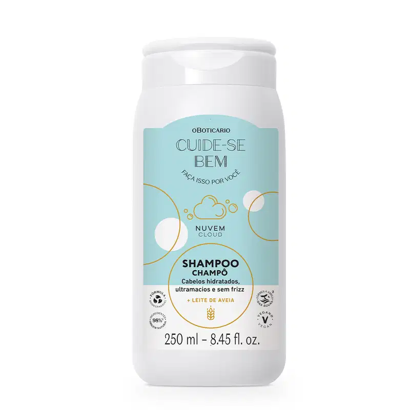Imagem de um frasco branco de shampoo da marca Cuide-se Bem Nuvem, com rótulo em tons de azul e círculos amarelos, contendo a descrição e informações sobre o produto para cabelos hidratados e sem frizz em letras pretas.
