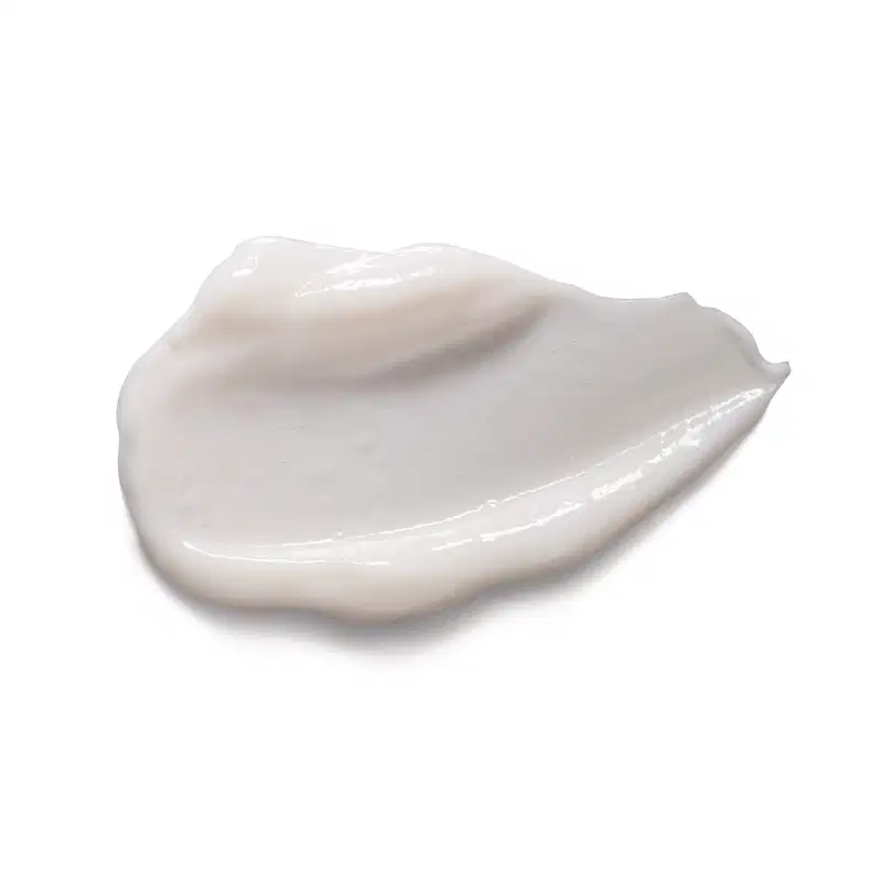 Imagem da textura cremosa e brilhante de condicionador Match Nutrição Regeneradora, com superfície lisa e uniforme. Possui cor branca e translúcida.