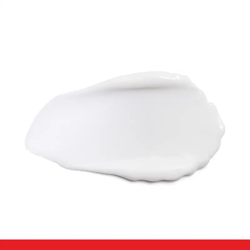 Textura branca, cremosa e brilhante de creme facial multirreparador calmante Botik Cica Pantenol E Ceramidas, com superfície lisa e uniforme, ocupando a maior parte da imagem.