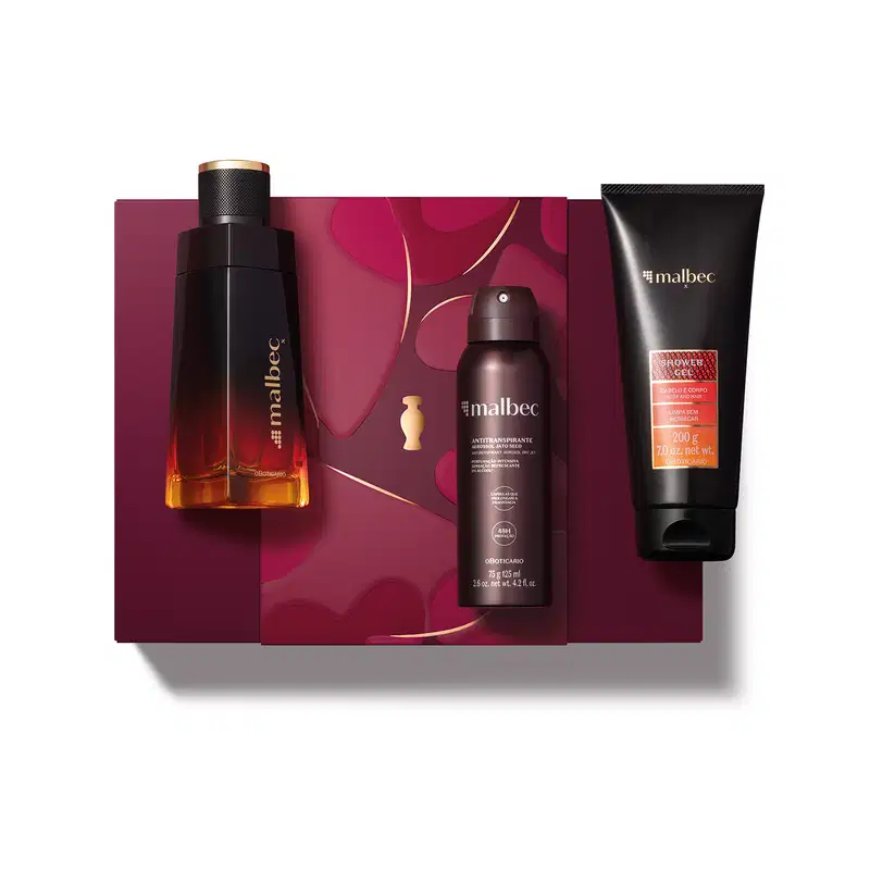 Kit de produtos da marca Malbec X, incluindo frasco de desodorante colônia preto e dourado, bisnaga de gel de banho preta com rótulo vermelho, embalagem preta com letras douradas de antitranspirante aerossol jato seco e caixa vinho com detalhe dourado.