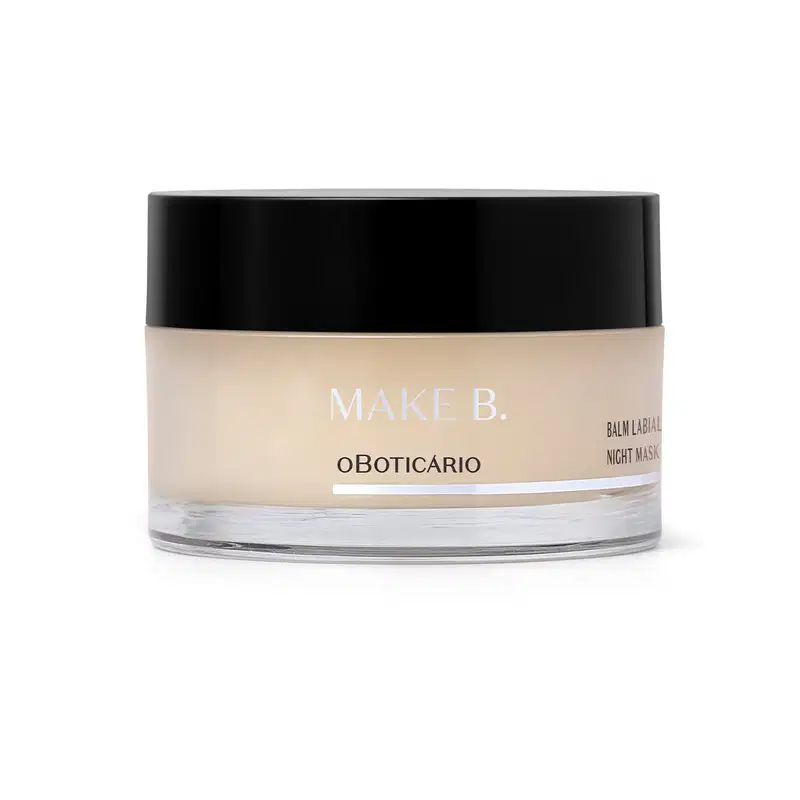 Pote de balm labial noturno da marca Make B. Lip Chronology Night Mask. O recipiente é redondo, com uma tampa preta e o rótulo exibe o nome da marca em letras brancas. Há detalhes branco na embalagem.