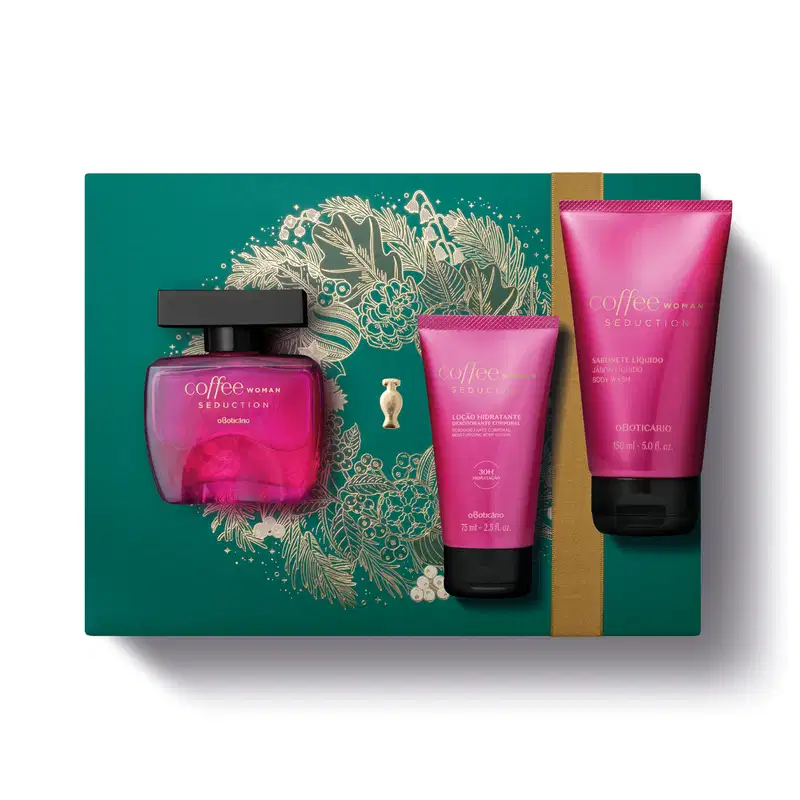 Imagem do Kit Presente Natal Coffee Woman Seduction com um frasco rosa e tampa preta de desodorante colônia, duas bisnagas pinks com tampa preta de sabonete líquido e loção hidratante corpora sobre uma caixa verde presenteável com ilustração natalina