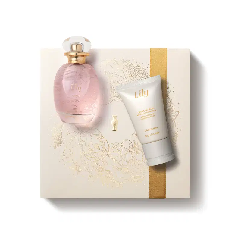 Imagem do Kit Presente Natal Lily Soleil com um vidro transparente e líquido rosa de desodorante colônia e uma bisnaga branca com letras douradas de creme acetinado para as mãos sobre uma caixa presenteável rosa-claro com estampa floral.