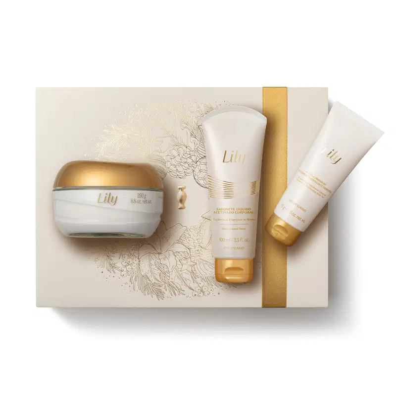 Imagem do Kit Presente Natal Lily com pote vidro e tampa dourada de creme hidratante corporal e duas bisnagas brancas e douradas, sendo uma de sabonete líquido e outra de geleia corporal sobre uma caixa presenteável rosa-claro com ilustração floral.
