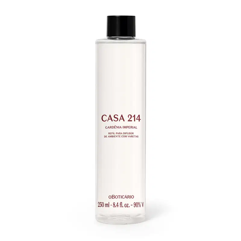 Imagem de um frasco transparente, tampa preta e rótulo com texto "CASA 214 GARDÊNIA IMPERIAL" em marrom, contendo 250 ml de fragrância para difusor de ambiente.