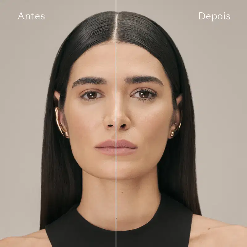 Ambiente de antes e depois de um tratamento de beleza da marca Make B. Imagem mostra rosto de uma mulher com cabelos escuros e expressão séria, com a divisão entre o antes e o depois do tratamento.