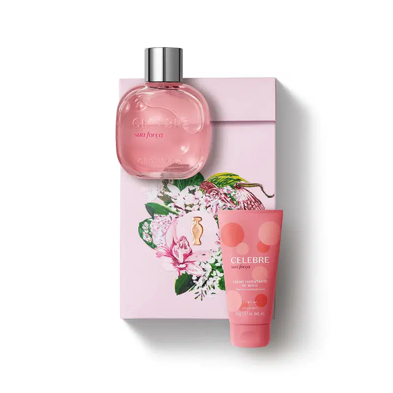 Imagem de kit de presente Celebre Sua Força, trazendo um frasco rosa com bolas amarelas e laranjas de creme hidratante para as mãos e um moderno vidro transparente com tampa prateada do desodorante colônia, além de uma caixa com ilustração floral.