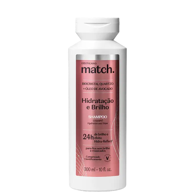 Frasco branco de shampoo da linha Match, com rótulo rosa destacando os ingredientes biocrystal quartz e óleo de abacate, para hidratação e brilho dos cabelos.