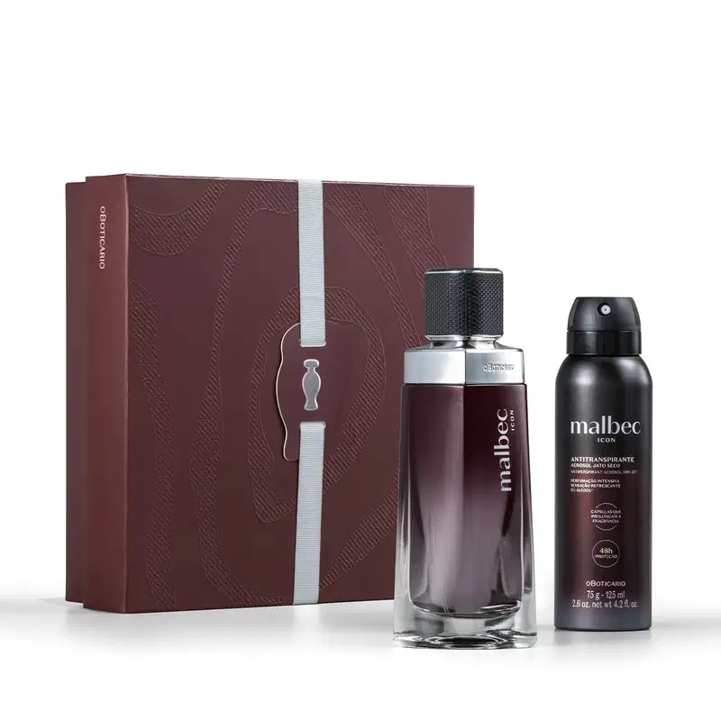 Caixa de presente marrom com padrão ondulado contendo um frasco de fragrância Malbec de cor escura e um desodorante aerossol da mesma marca em embalagem vinho.