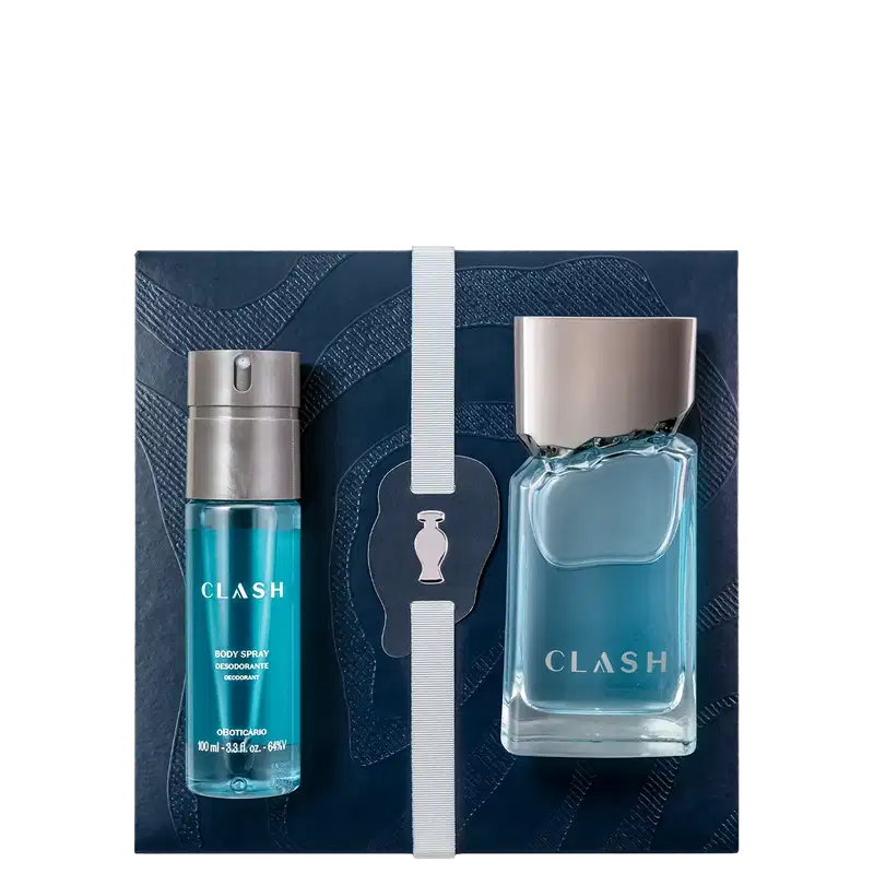 Caixa de presente azul-marinho com dois itens de perfumaria da marca Clash: um frasco de perfume e um frasco de desodorante corporal, ambos em tons de azul e cinza, sobre superfície escura.