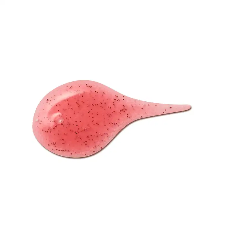 Imagem da textura rosada, brilhante e granulada do esfoliante facial Cuide-se Bem Morango, com pequenos pontos escuros espalhados pela superfície.