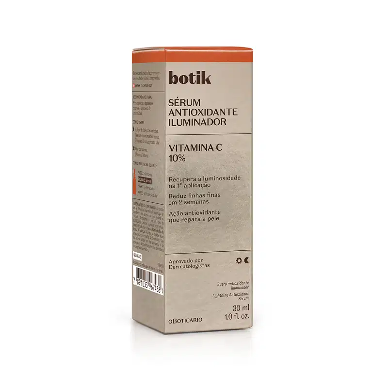 Embalagem retangular dourado e laranja, com informações sobre os benefícios do produto no rótulo.