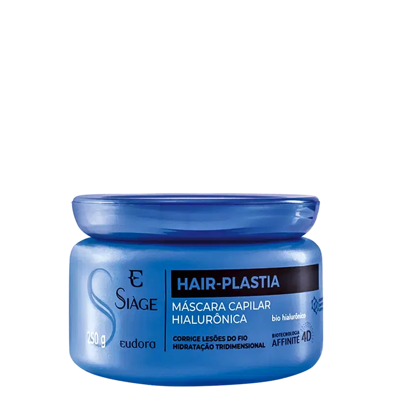 Frasco de máscara capilar hialurônica da marca Eudora, com embalagem azul e rótulo preto destacando o nome "Hair-plastia". O produto promete corrigir lesões do fio e hidratação tridimensional.