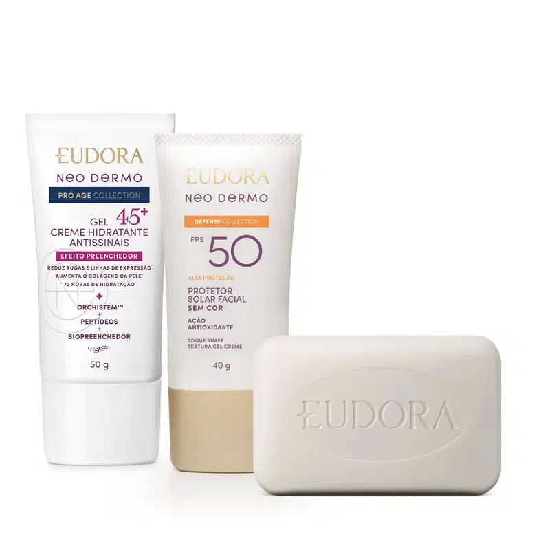 Produtos da linha Neo Dermo da Eudora, incluindo um gel creme hidratante antissinais 45+, um protetor solar facial FPS 50 e um sabonete em barra. As embalagens apresentam design clean e cores neutras, com destaque para o logotipo da marca.