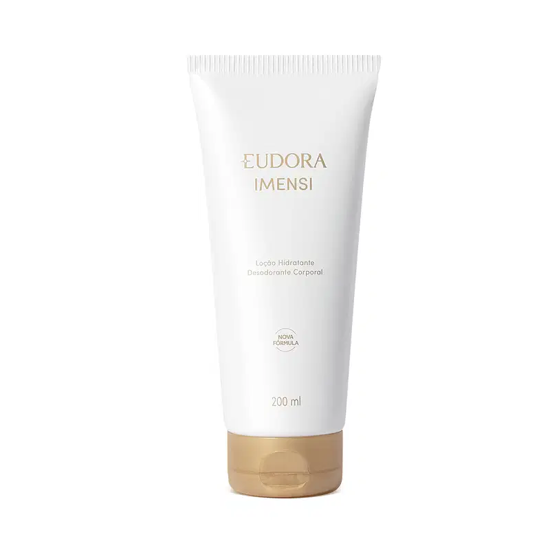 Embalagem tubular branca de plástico com detalhes em dourado. Rótulo com o nome do produto em letras douradas. Tampa dourada redonda na parte inferior da embalagem.