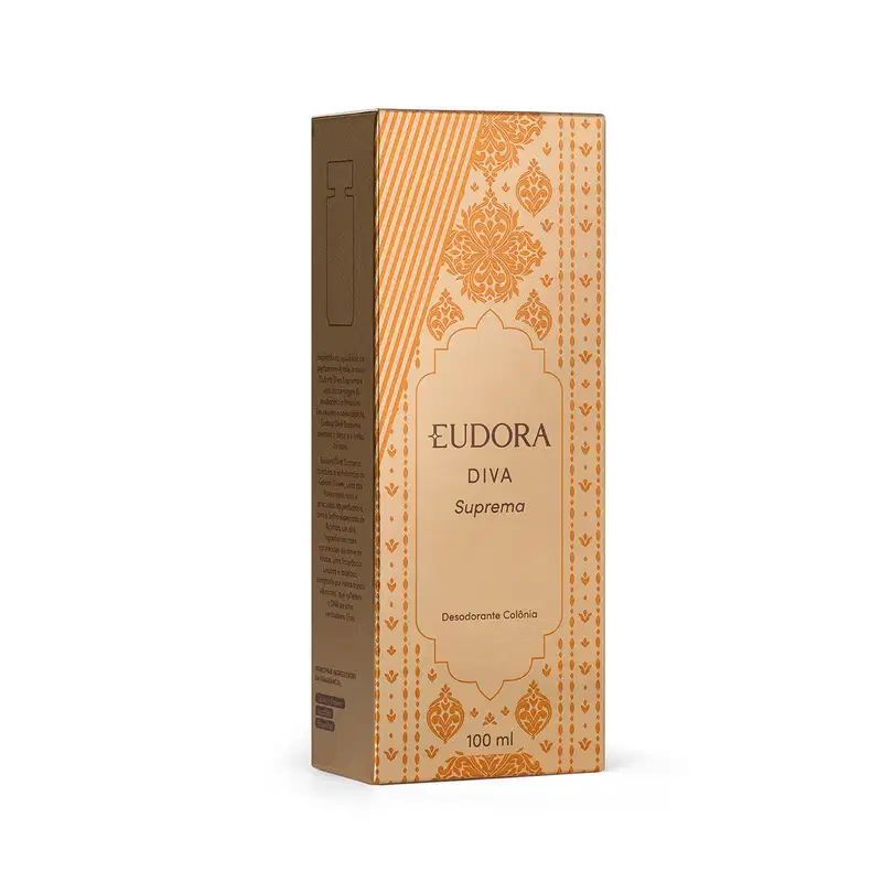 Embalagem do desodorante colônia da linha Diva Suprema da marca Eudora. A embalagem é uma caixa retangular de cor bege com detalhes em tons dourados, apresentando um padrão decorativo com elementos florais e geométricos.