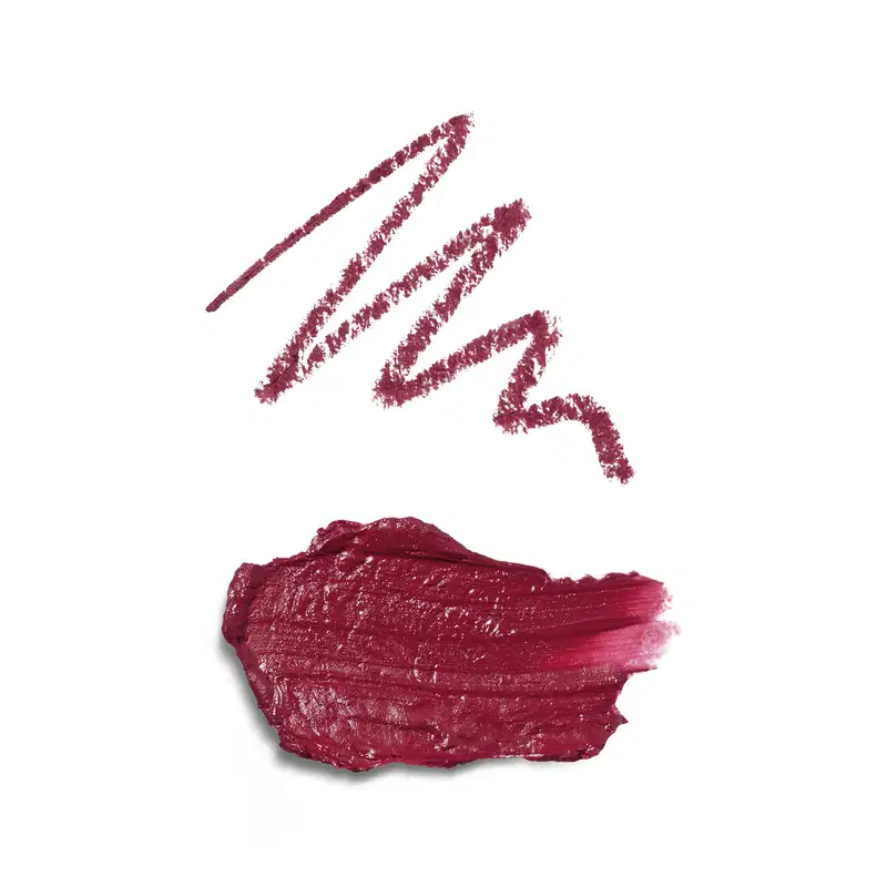 A embalagem não é visível na imagem, que mostra apenas a textura do produto. Na primeira, o risco da lapiseira delineadora e a segunda do batom, ambos na cor rosa.