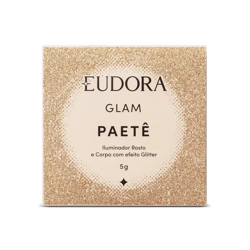 Embalagem do produto Glam Paete da marca Eudora. Possui um fundo dourado brilhante, com o nome da marca em destaque no centro, seguido pela descrição "GLAM PAETE" e informações adicionais sobre o produto: iluminador rosto e corpo com efeito glitter, 5g.