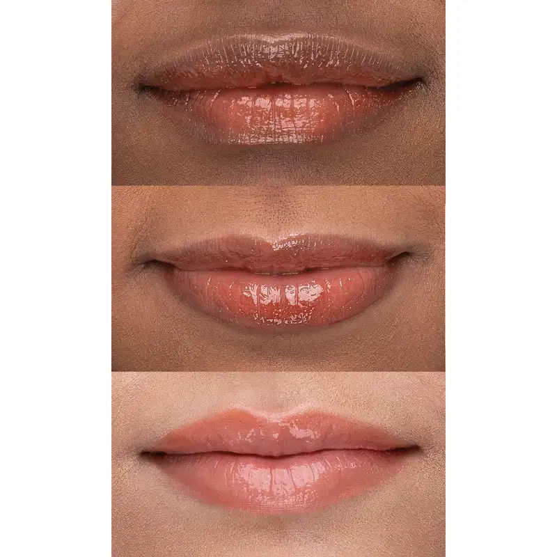 Imagem de 3 lábios femininos em close-up, com aplicação do gloss em diferentes tons de pele, branca, parda e negra mostrando que gloss atende aos três tons de pele, sendo mais rosado na pele branca e mais avermelhado na pele escura.