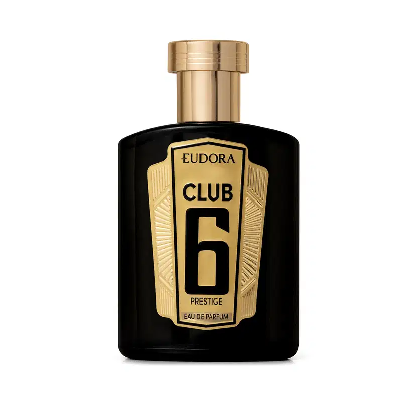 Frasco de item de perfumaria preto e dourado com rótulo destacado "Eudora Club 6 Prestige". O frasco possui formato retangular com detalhes geométricos dourados na tampa e na parte inferior. 