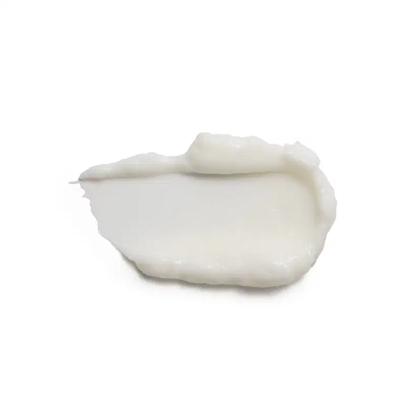 Textura cremosa e sedosa, com aparência suave e brilhante, típica de produtos Siàge. Cor branca leitosa, transmitindo sensação de maciez e hidratação.