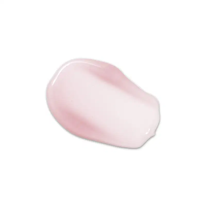 Textura de produto de maquiagem com aspecto cremoso, brilhante e translúcido em tom rosado claro.