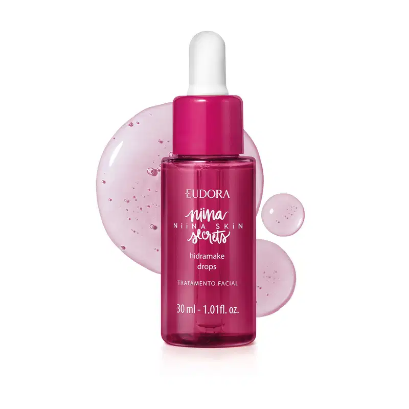 Frasco rosa com gotejador branco contendo sérum Eudora Niina Skin Secrets Hidramake Drops, 30ml, com gotas de textura líquida translúcida e brilhante ao fundo.