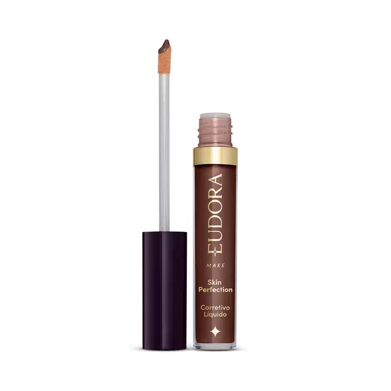 Produto de maquiagem da marca Eudora, com embalagem em tons de marrom e dourado. Trata-se de um corretivo líquido para a pele, o produto está aberto e mostrando como é o aplicador.
