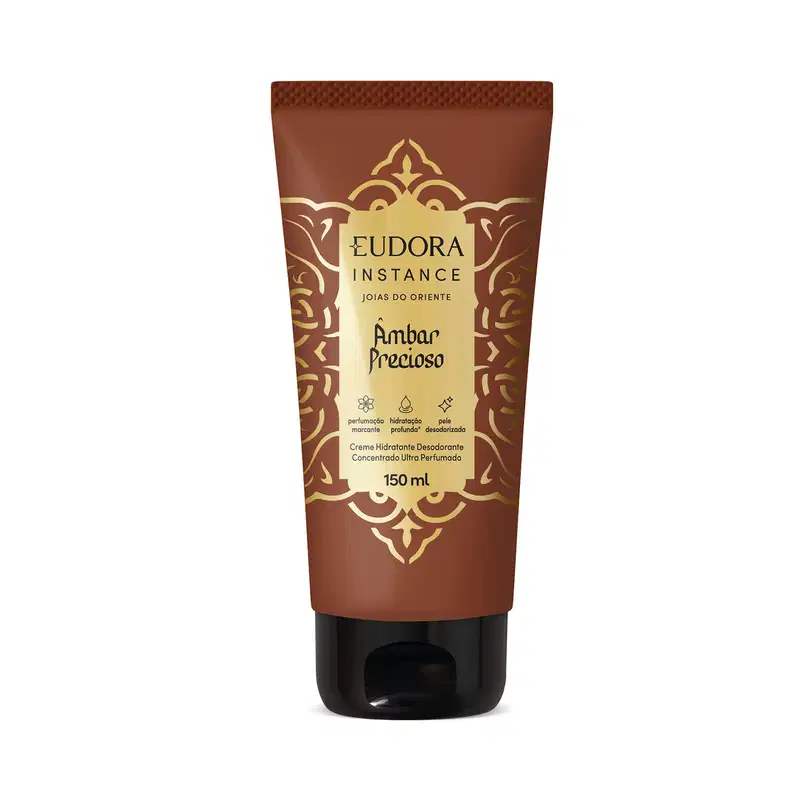 Frasco de creme hidratante desodorante concentrado ultra perfumado da marca Eudora Instance, com embalagem marrom e dourada, rótulo com texto "Âmbar Precioso" e desenhos ornamentais decorativos.