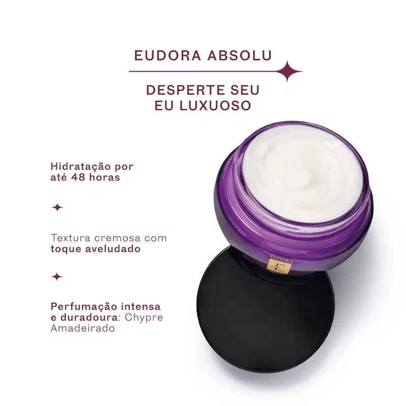 Embalagem roxa do creme corporal da marca Eudora com texto "Desperte seu eu luxuoso" e "Hidratação por até 48 horas". Textura cremosa com toque aveludado. Item de perfumaria com fragrância intensa e duradoura de Chypre Amadeirado.