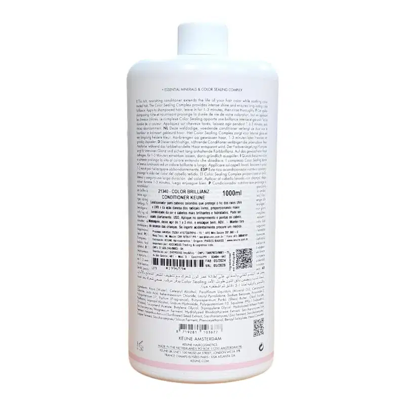 Frasco branco de condicionador Keune Color Brillianz de 1000ml, com rótulo detalhado em várias línguas descrevendo os benefícios do produto para cabelos coloridos.