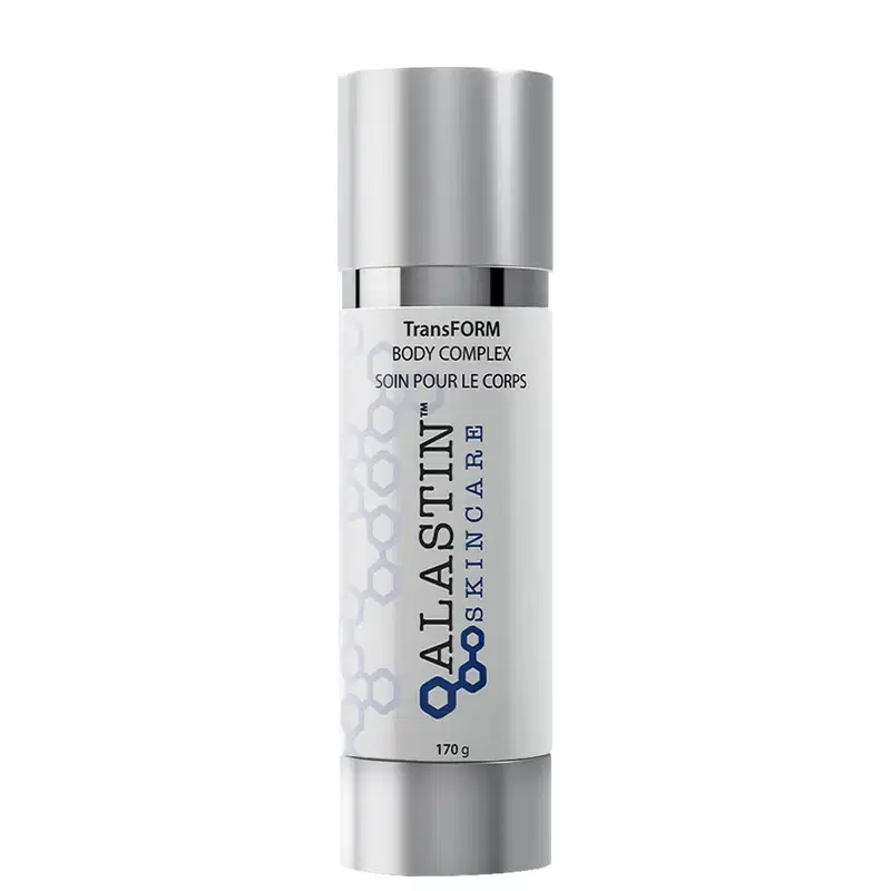 Creme firmador corporal Alastin. Embalagem cilíndrica de metal prateado. Rótulo branco com texto "TransFORM BODY COMPLEX" e "SOIN POUR LE CORPS" em letras pretas. Logotipo da Alastin em hexágonos cinza.