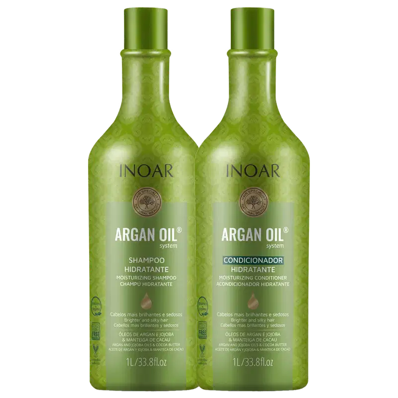 São dois frascos de plástico verde brilhante de 1 litro cada, com tampas verdes. Os frascos têm um design texturizado com um padrão geométrico em relevo. O rótulo indica que são produtos da linha Argan Oil System da marca Inoar.