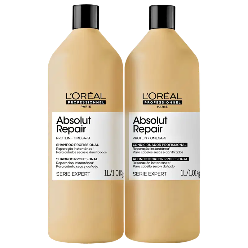 Dois frascos de shampoo e condicionador da linha Absolut Repair da L'Oréal Professionnel, com embalagens em tons de bege e preto, contendo informações sobre os produtos na frente.