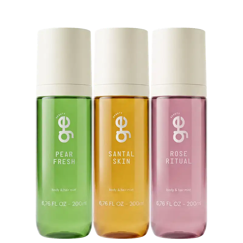 Três frascos transparentes de 200ml da GE Beauty, com tampas creme: Pear Fresh (verde), Santal Skin (âmbar) e Rose Ritual (rosa), todos "body & hair mist".