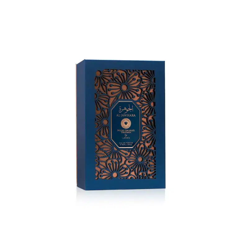Caixa azul escura com detalhes em relevo dourados, contendo frasco de perfume da marca Lattafa Perfumes, chamado "Al Jawhara". Embalagem com design elegante e sofisticado.