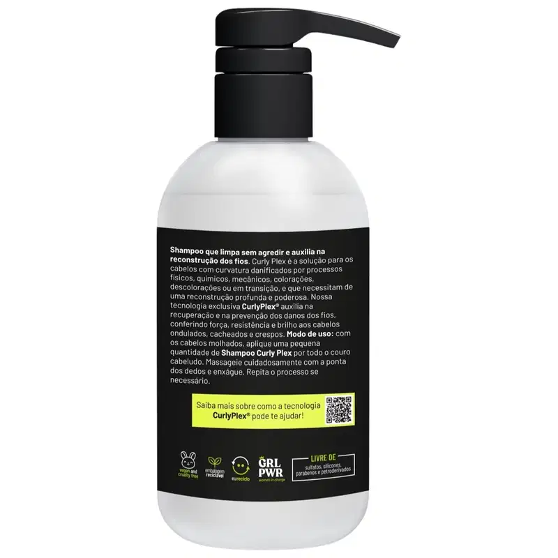 Shampoo em embalagem plástica branca com detalhes em preto. A embalagem tem um dispensador bomba preta. O rótulo preto contém texto descritivo em português sobre o produto, que é um shampoo para cabelos cacheados e danificados.