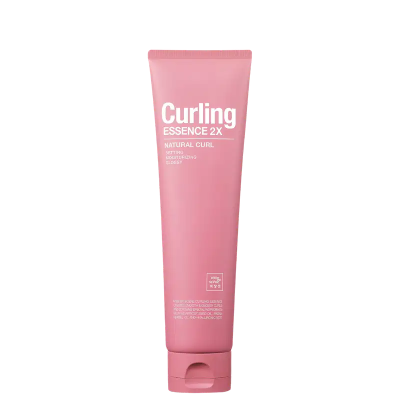Tubo rosa com rótulo "Curling Essence 2X" da marca Mise en Scène, contendo um produto para cabelos cacheados com propriedades de fixação, hidratação e brilho.