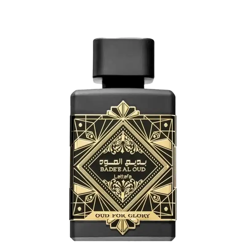 Frasco de perfume preto e dourado da marca Lattafa Perfumes, com rótulo em estilo art déco exibindo o nome "Badeeal Oud" e a descrição "Oud for Glory". O design é elegante e sofisticado, com detalhes decorativos dourados.