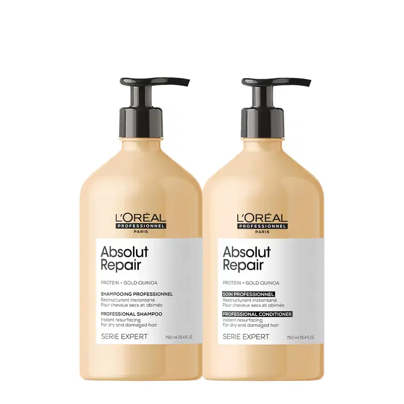 A imagem mostra dois frascos de plástico de produtos para cabelos secos e danificados da linha Serie Expert da L'Oréal Professionnel. Os frascos têm formato cilíndrico e cor bege, com bombas dosadoras pretas no topo.
