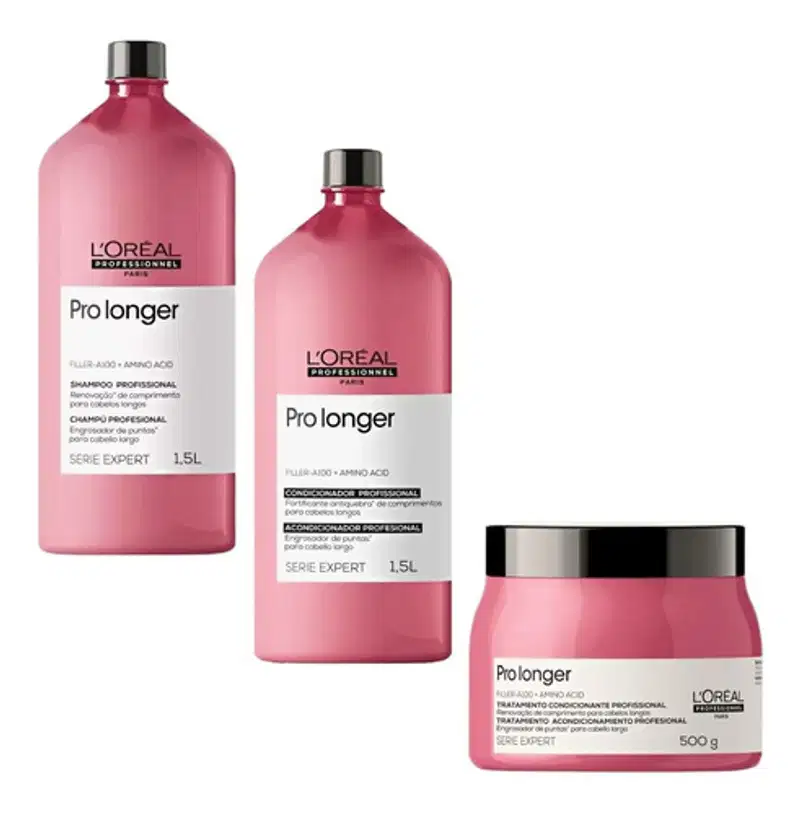 A imagem mostra 3 produtos da linha Pro Longer da L'Oréal Professionnel. Um shampoo em uma embalagem plástica rosa de 1,5L. Outro é um condicionador em uma embalagem semelhante de 1,5L. O terceiro é uma máscara capilar em um pote rosa de 250g.