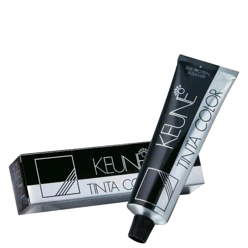 Produto de coloração permanente para cabelos Tinta Color da marca Keune. Embalagem retangular preta com detalhes em branco contendo o nome do produto e da marca.